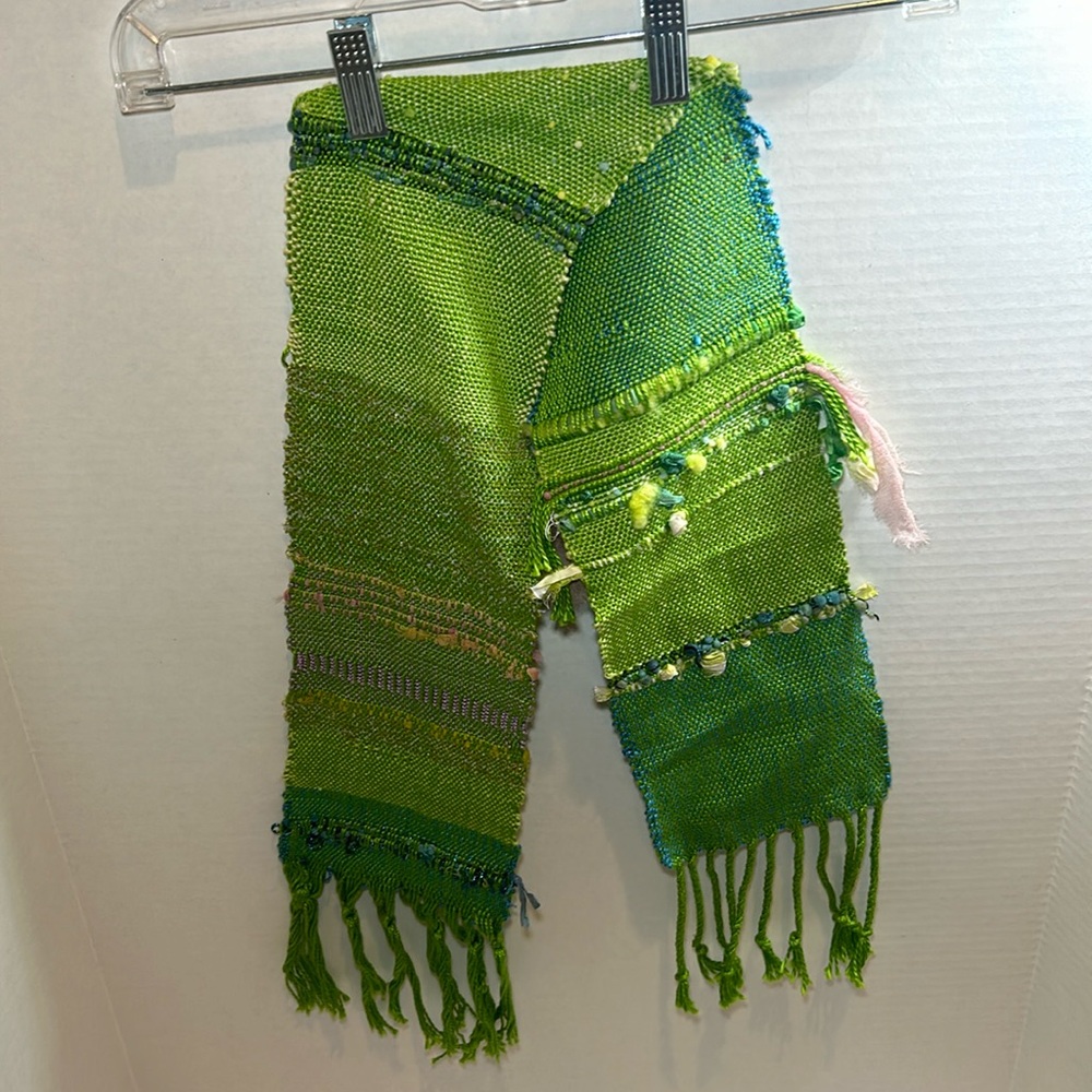 Rigid Heddle woven scarf. 40” long with 5” tassels on each end.